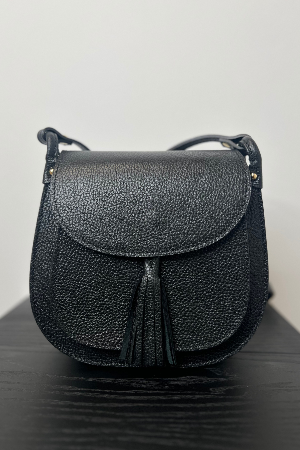 Italian Black Saddle Crossbody Bag with Tassel Jude Law Boutique